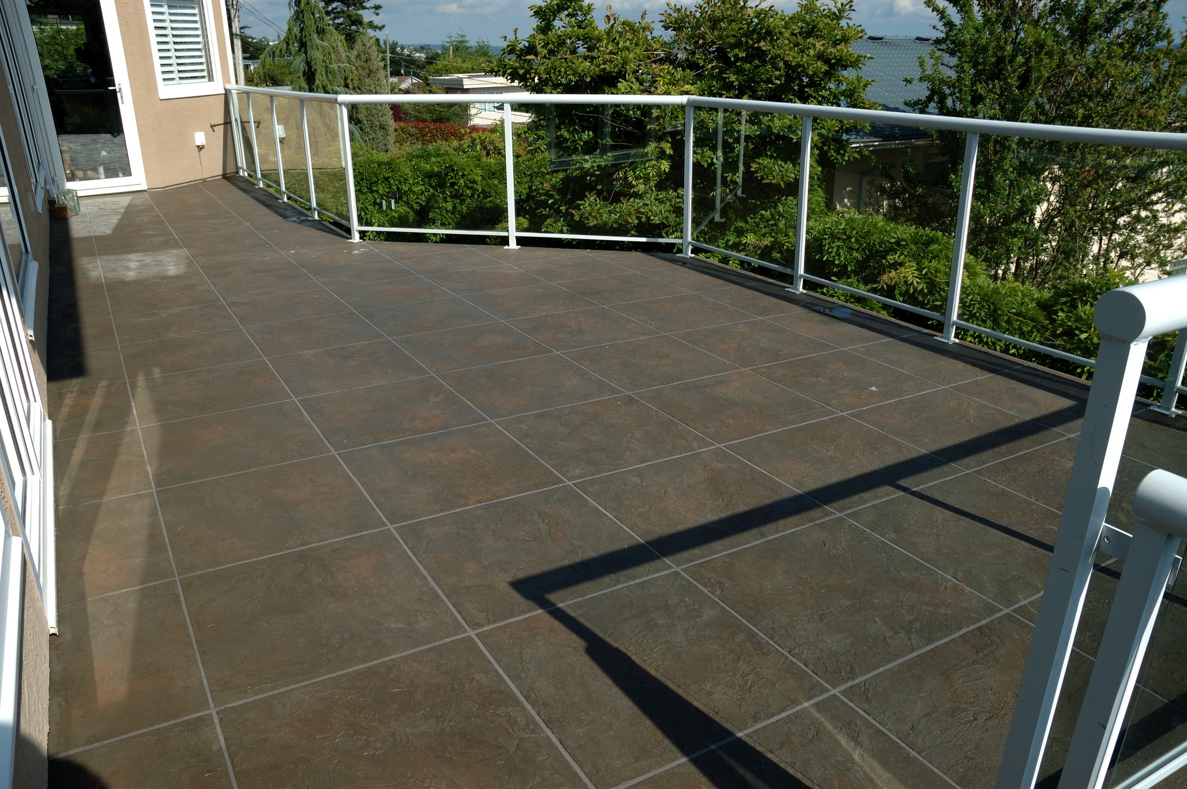 Elevated balcony with StoneCraft flexible waterproof membrane system
