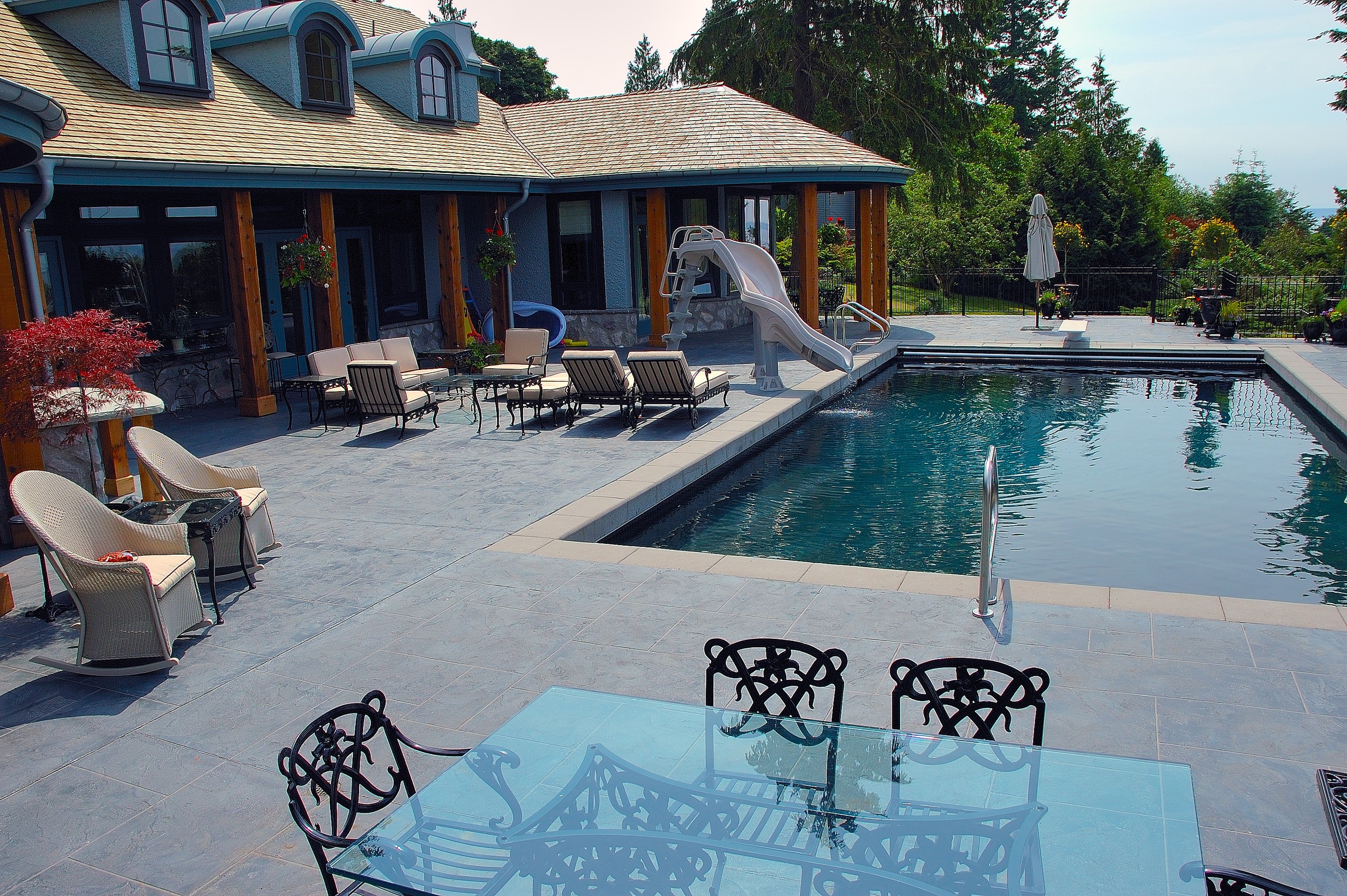 Premium StoneCraft pool deck surfacing with seamless slip-resistant finish